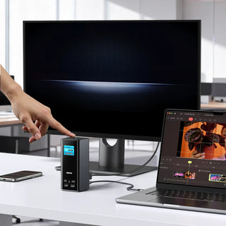 Steam Deck docked to a versatile hub, enabling a full-featured desktop setup with displays, inputs, and storage.